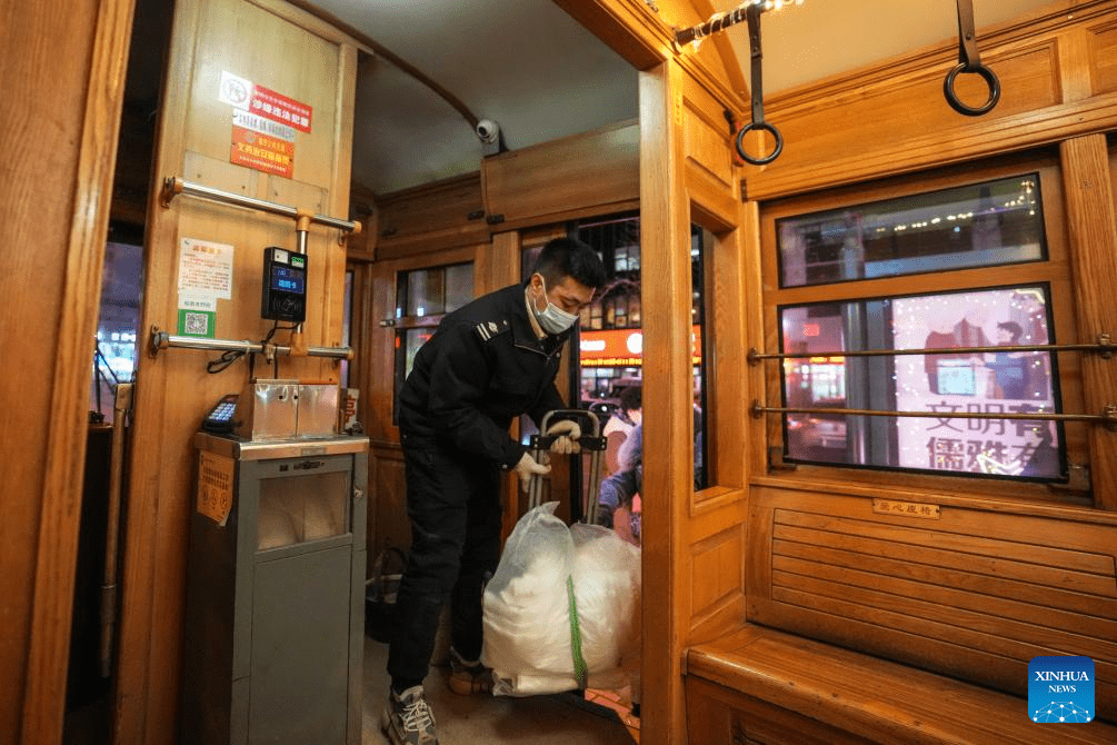 Trams decorated with lights to attract tourists in Dalian, China's Liaoning-10