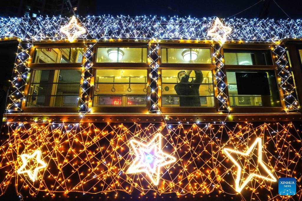 Trams decorated with lights to attract tourists in Dalian, China's Liaoning-3