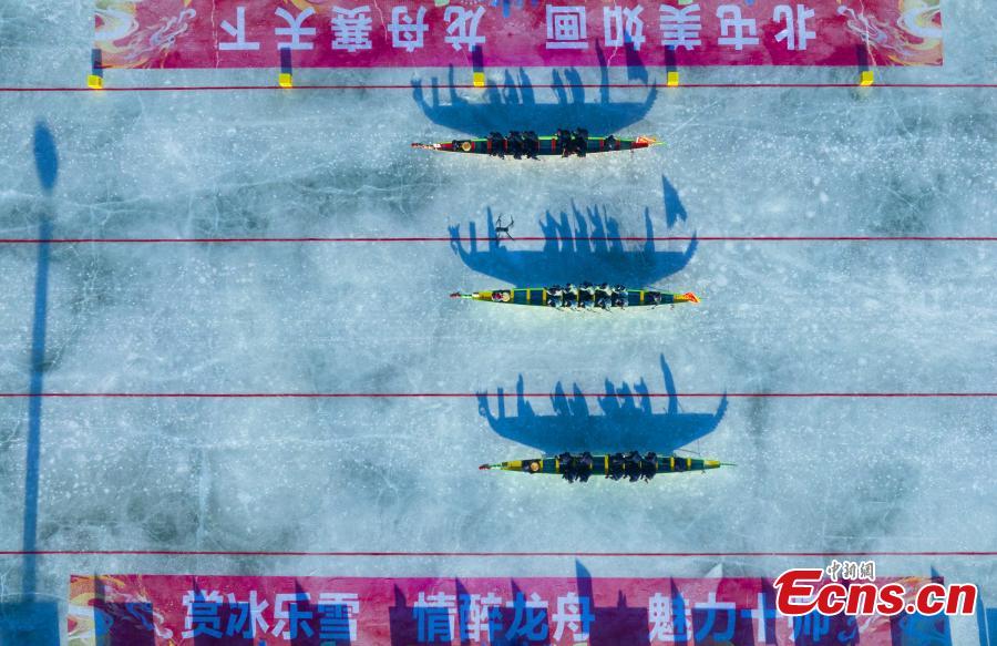 Dragon boat race on ice staged in Xinjiang-1