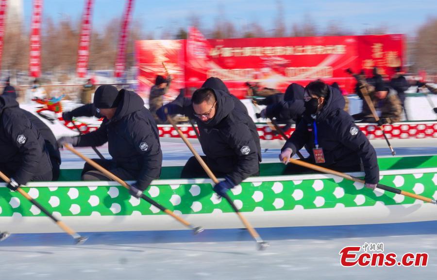 Dragon boat race on ice staged in Xinjiang-3