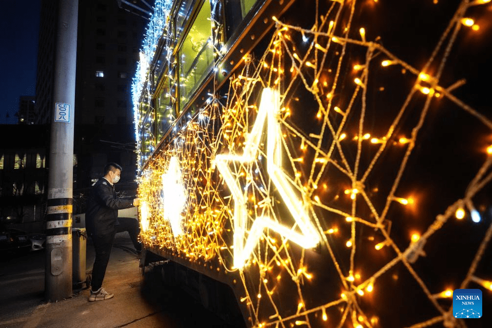 Trams decorated with lights to attract tourists in Dalian, China's Liaoning-4