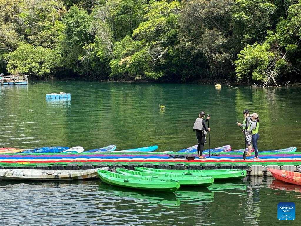 Tourists visit Riyue Tan scenic spot during holiday of Dragon Boat Festival-3