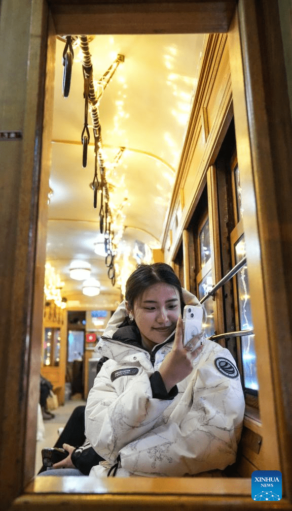 Trams decorated with lights to attract tourists in Dalian, China's Liaoning-12