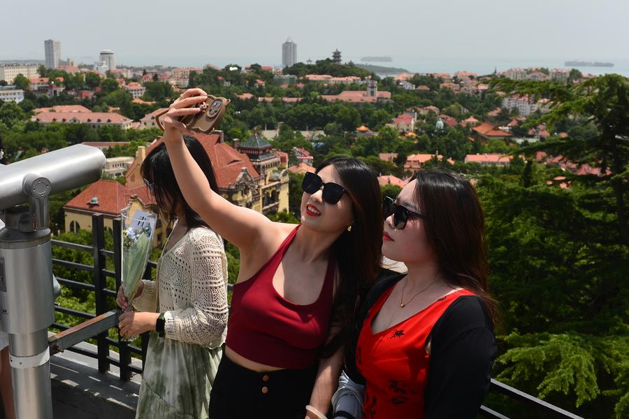 Tourism in Qingdao heats up in hot summer days-5