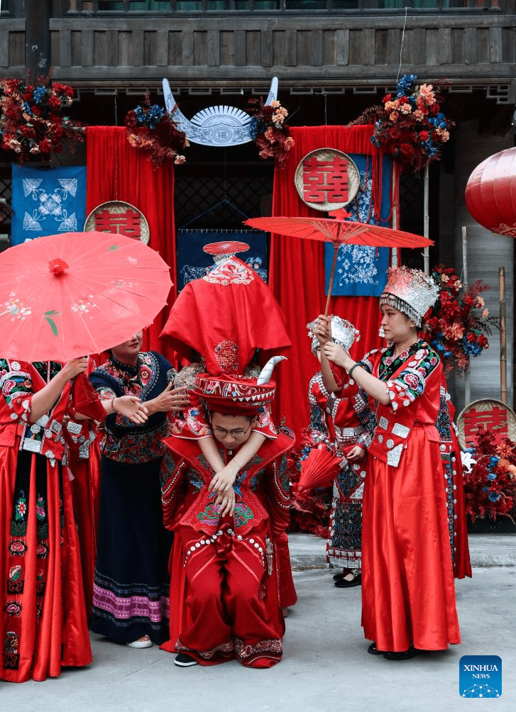 Local authorities in SW China leverage ethnic features to boost summer tourism-13