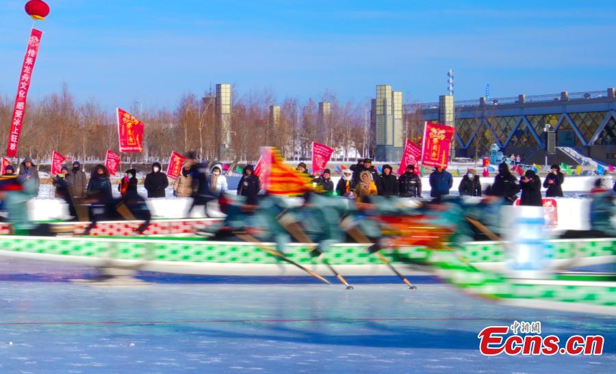 Dragon boat race on ice staged in Xinjiang-4