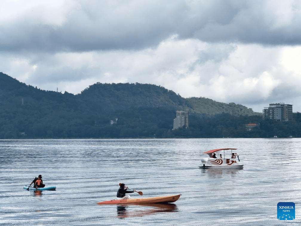 Tourists visit Riyue Tan scenic spot during holiday of Dragon Boat Festival-5