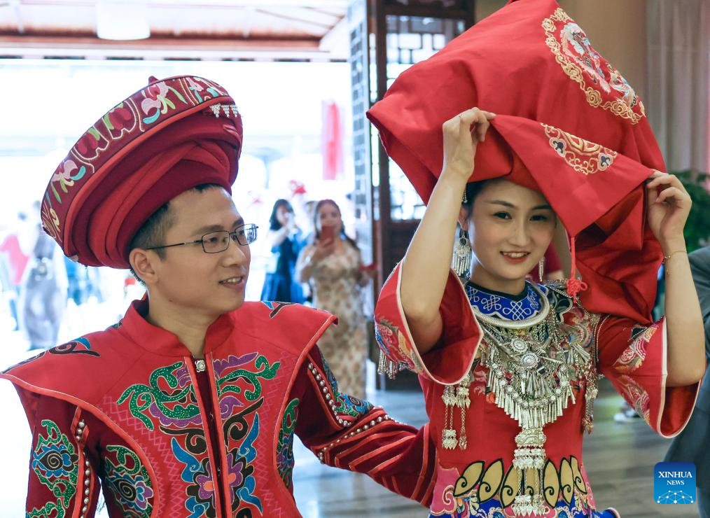 Local authorities in SW China leverage ethnic features to boost summer tourism-11