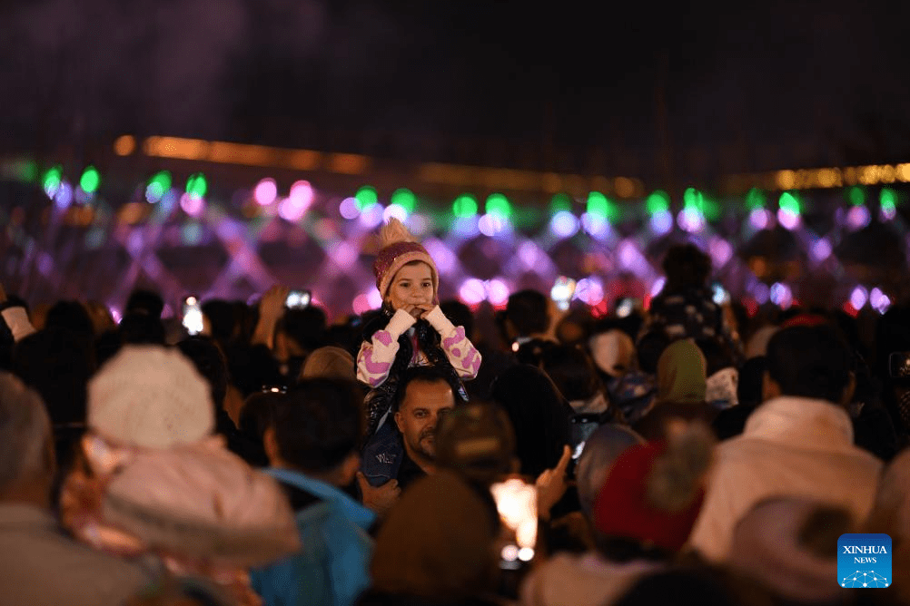 People watch firework show in Tehran, Iran-1