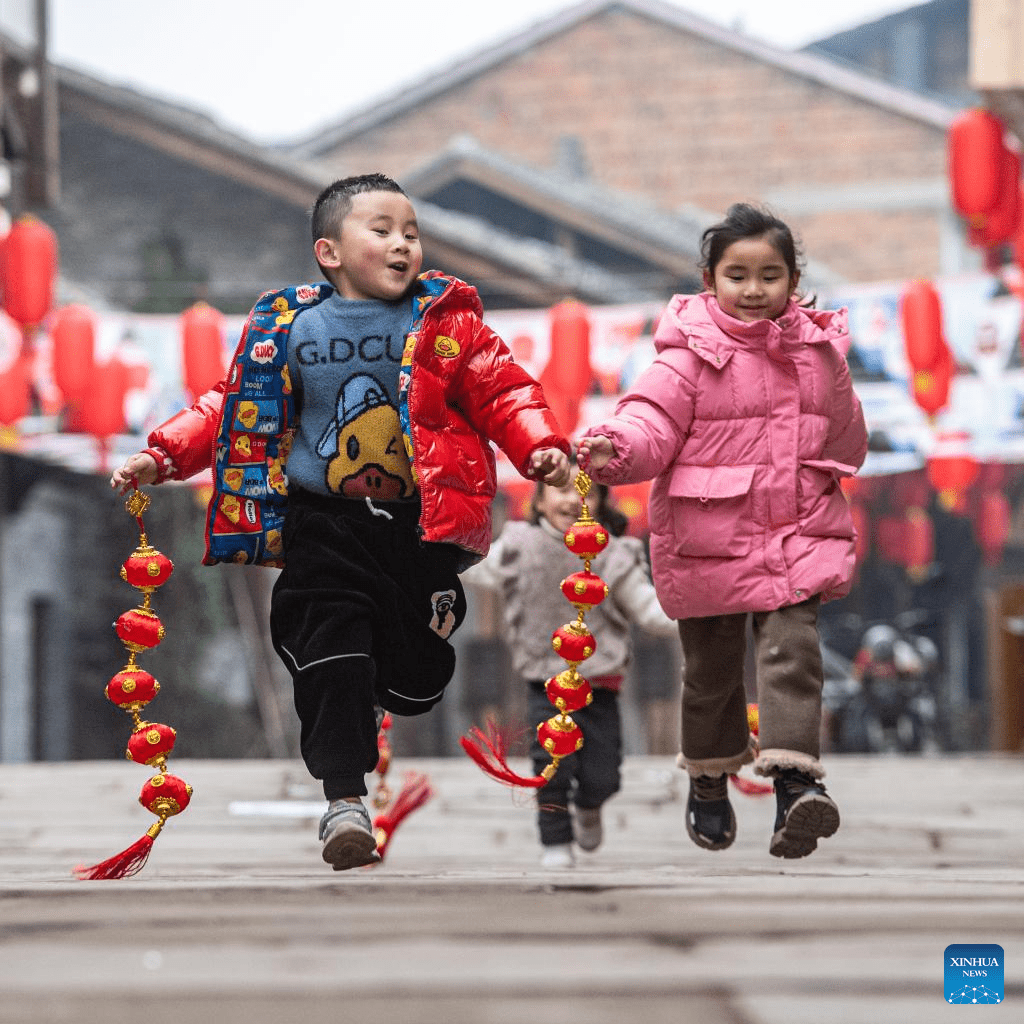 Decorations set up to celebrate upcoming Spring Festival in Yongxi ancient town, SW China-5