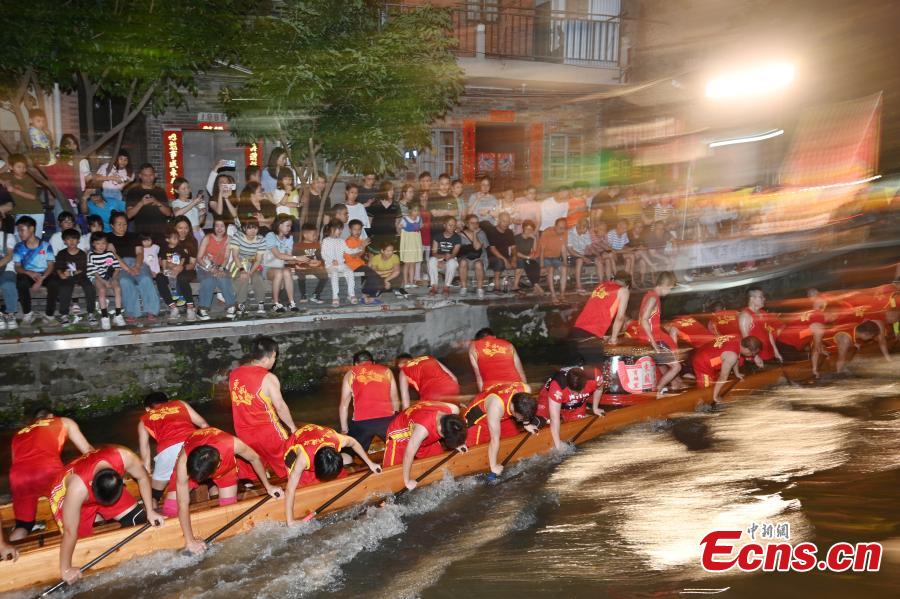 Villagers enhance night training for upcoming Dragon Boat Festival in Guangdong-5