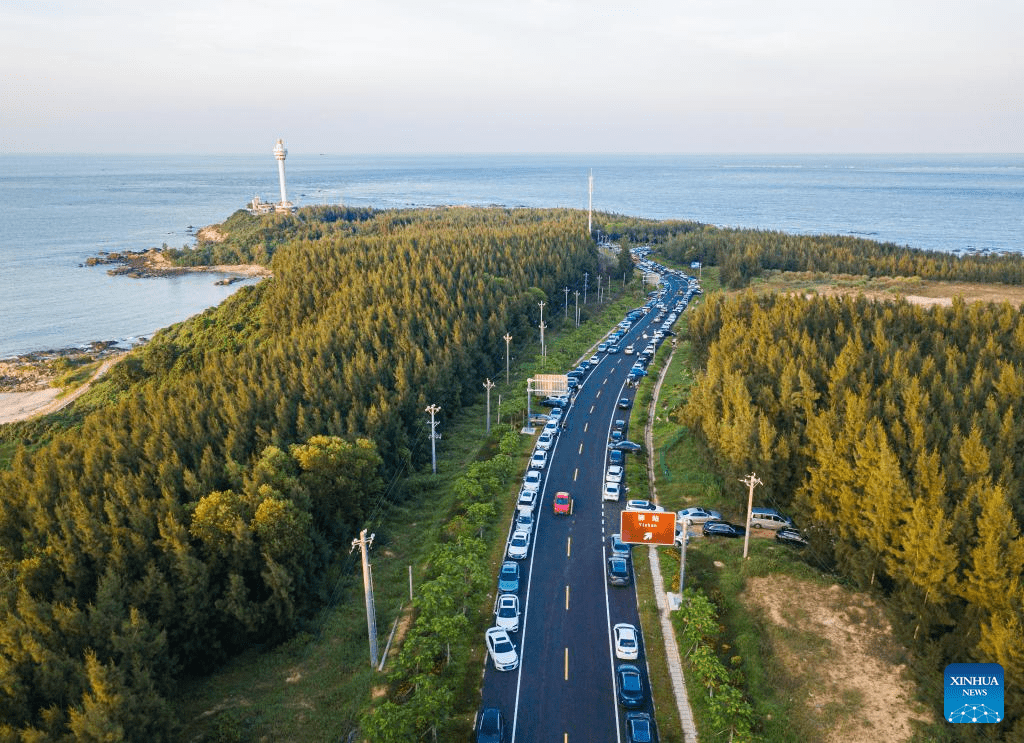 Scenic coastal highway attracts tourists for self-driving tour during holiday in Hainan-3