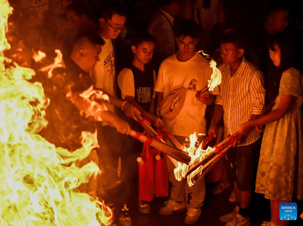 Torch festival celebrated in Chuxiong, SW China-4