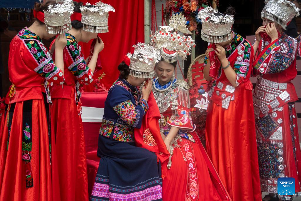 Local authorities in SW China leverage ethnic features to boost summer tourism-9