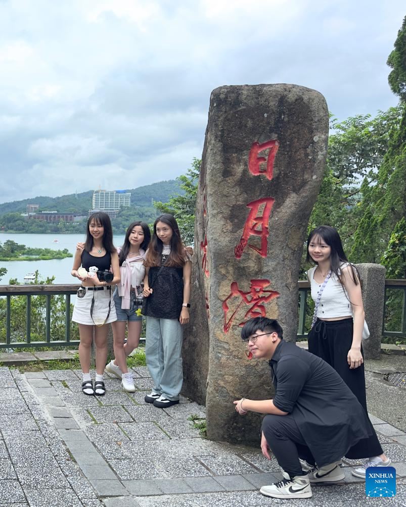 Tourists visit Riyue Tan scenic spot during holiday of Dragon Boat Festival-4