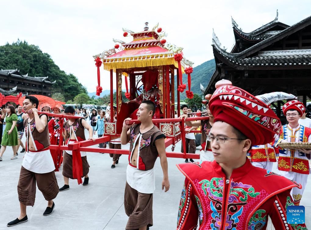 Local authorities in SW China leverage ethnic features to boost summer tourism-5