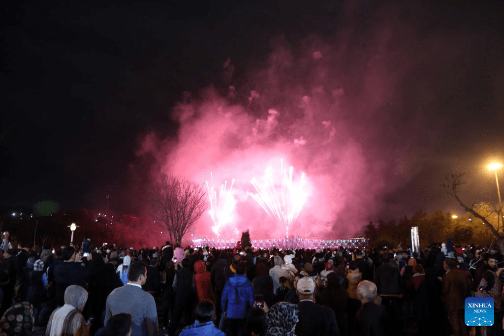 People watch firework show in Tehran, Iran-7