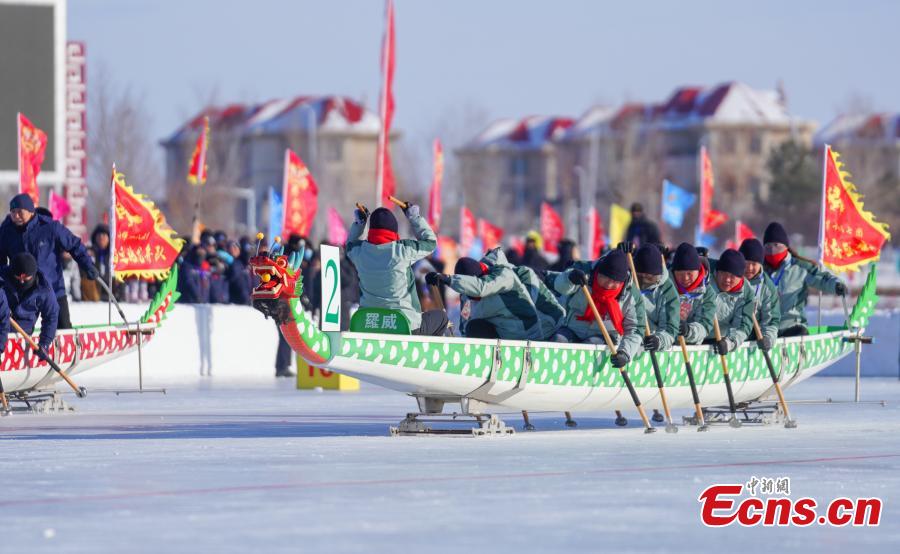 Dragon boat race on ice staged in Xinjiang-2