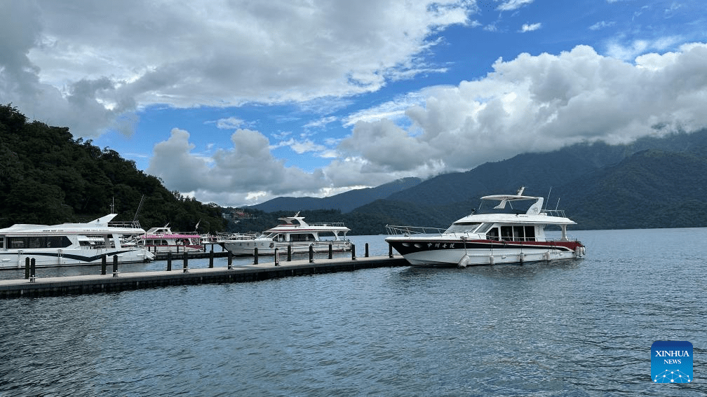 Tourists visit Riyue Tan scenic spot during holiday of Dragon Boat Festival-1