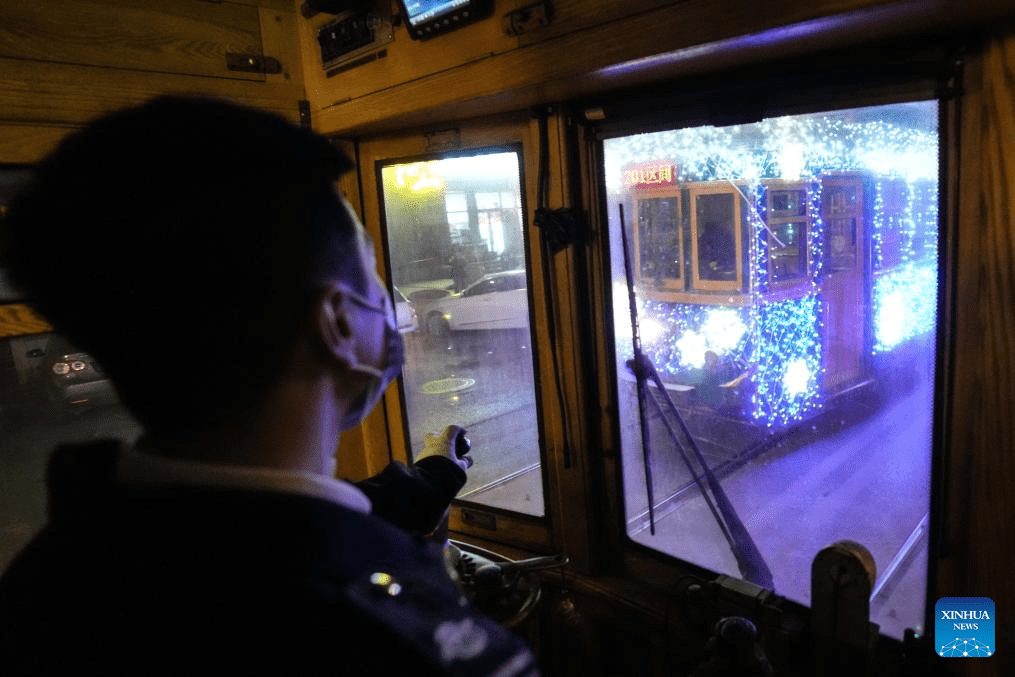 Trams decorated with lights to attract tourists in Dalian, China's Liaoning-11