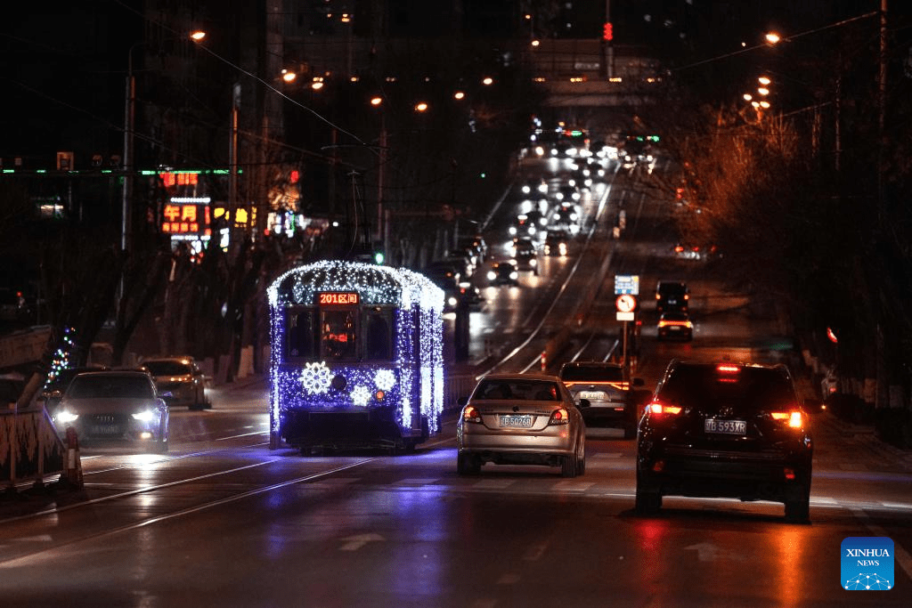 Trams decorated with lights to attract tourists in Dalian, China's Liaoning-7