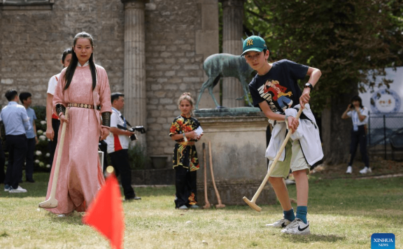 Children experience cultural activities at China House for Paris 2024 Olympic Games