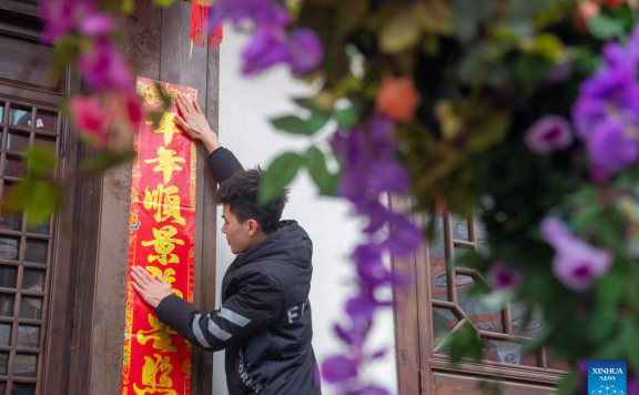 Decorations set up to celebrate upcoming Spring Festival in Yongxi ancient town, SW China