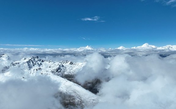 Spectacular views emerge after snowfall at Baima Snow Mountain